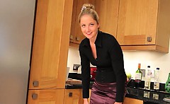 Blonde pornstar in kitchen teasing hard