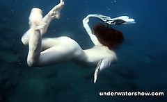 Nastya swimming nude in the sea