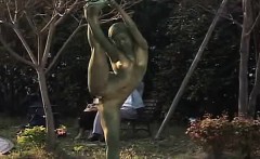 Subtitled Japanese woman painted to mimic park statue