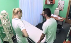 Handyman fucks nurse on exam table