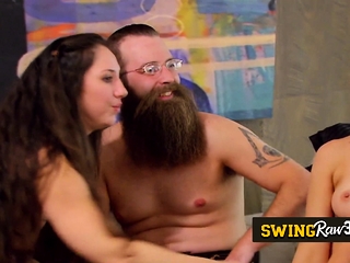 Young and mature swinging couples on TV.