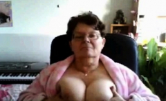 naughty granny flashing her big tits on cam