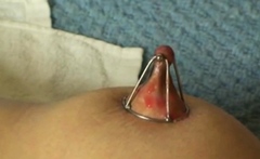 Nipple clamps and glowing wax