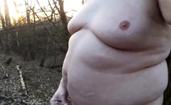 Chubby masturbates in the woods