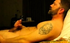 Hairy bear jacking on bed