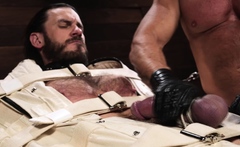Greg Dixxon taunts Vander Pulaski by sucking his bound cock