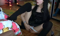 Small titted brunette Sharron with glasses masturbates